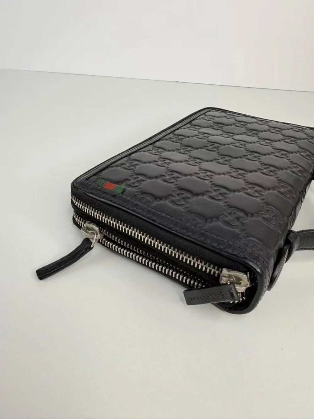 Gucci Signature GG Embossed Leather Zip Around Travel Organizer Clutch Wallet